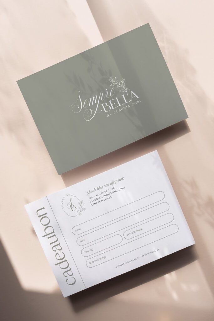 gift certificate design with main logo on the front and secondary monogram logo design on the back