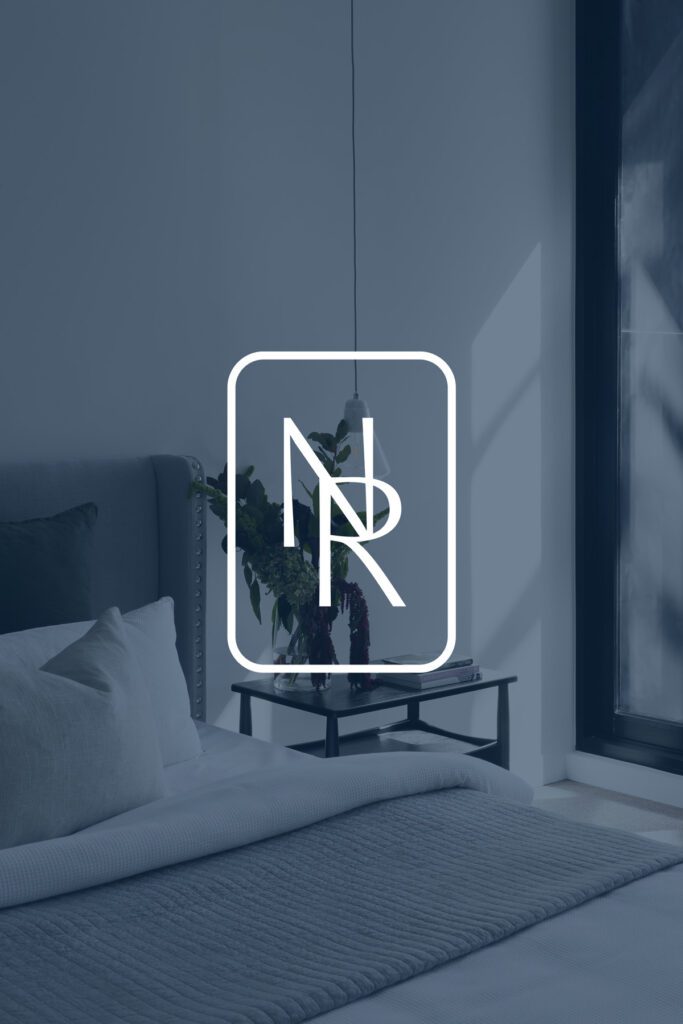 mortgage broker logo monogram NR in white on a dark blue photo overlay
